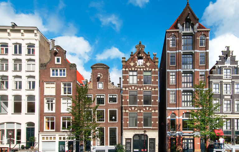 Merchant houses along Amsterdam’s Heerengracht canal. Getty Images